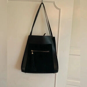 H&M Gorgeous faux leather and suede  bucket style purse. In black.